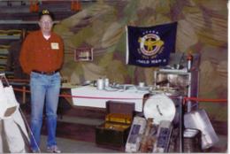 David Castle displays Army field feeding equipment from the World War II, Korean War and Vietnam War periods