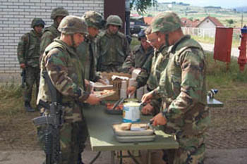 The eager Marine's of Lima Battery line up quickly for their dinner of Lasagna